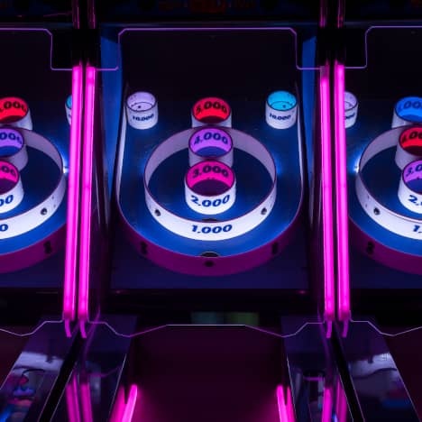 Neon-colored Skeeball game