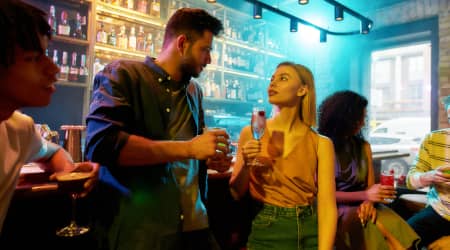 Couple having Conversation at a Bar