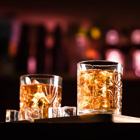 Two Whiskey on the Rocks at a Luxury Bar